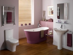 White bathroom with a touch purple