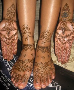 henna decorated hands and feet