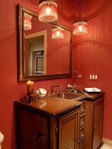 overhead lighting in red bathroom