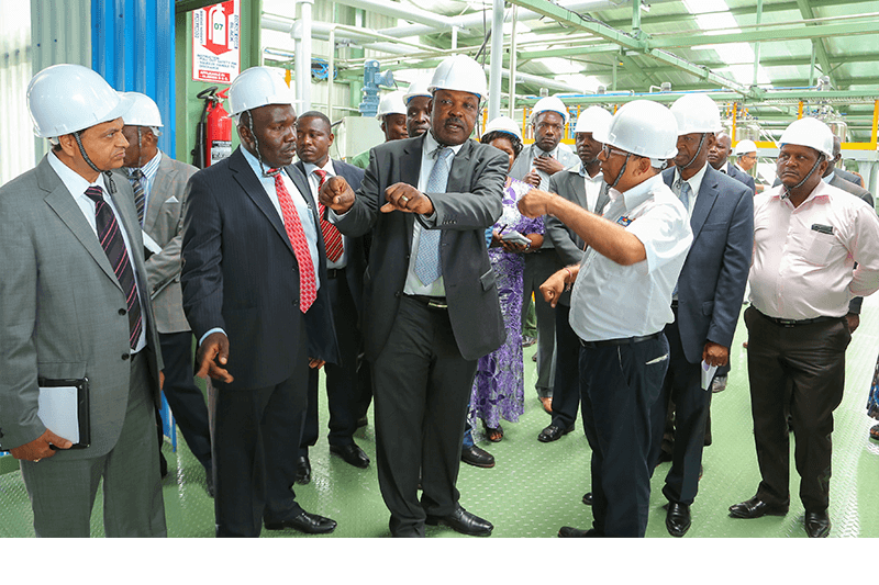 From left: Crown Paints CEO, Rakesh Rao, State Department of industry and Enterprise Development - Principle Secretary, Julius Korir, His Excellency the Governor of Kisumu, Hon Jack Raguma (second right) and the factory Head, Shailesh Patel.